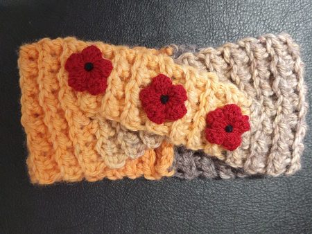 Headband - Beige Grey Orange variegated with rusty red flowers. For Sale